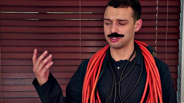 Hot redhead seduces and fucks a repairman in the kitchen