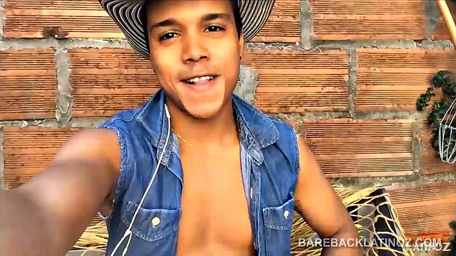 Our featured solo boy of the week is this cute Latin boy, who keeps his hat on the entire video. But, as the shorts peel off we can see a sexy little happy trail that leads to a monster uncut cock.