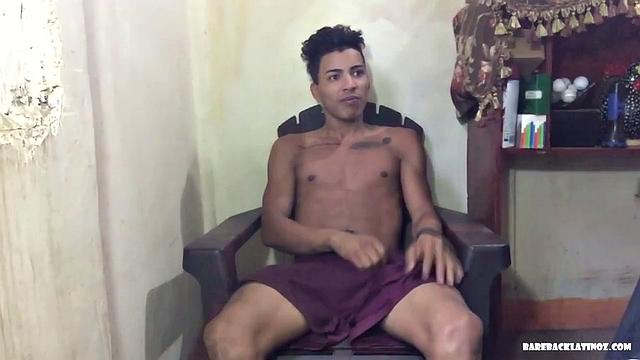 Our featured solo of the week is Latin boy Alejandro, who is ready to jerk off. He quickly strips naked and starts tugging at his uncut cock, until it's hard.