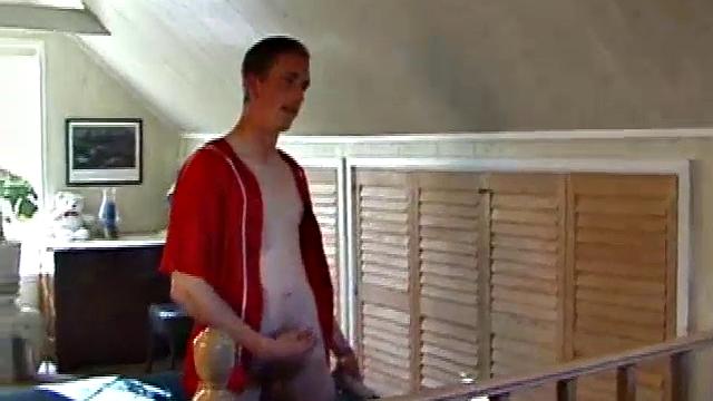 Derek is rubbing his cock through his sweat pants, before stripping them off to show us what he's packing. With the remote control in one hand and his lubed cock in the other, Derek comments on the of his cock asking if we like it.