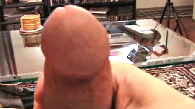 Travis Martinez starts out on the sofa to strip naked and get his dick boned up. Then he is all over the place, as he strokes hard and makes his big balls bounce. Eventually the horny young man blows his load.