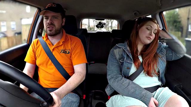 Redhead tattooed babe gets publicly fucked by instructor in car