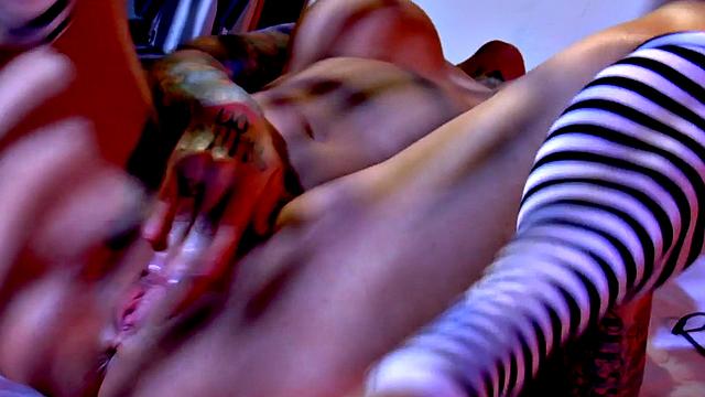 Tattooed glamour babe with big tits masturbating solo