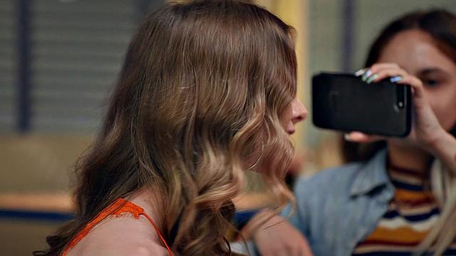 Watch this American babe give a killer handjob and finger blast while riding her cowgirl position