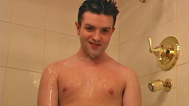 Sexy 21 year old Jeremy West is enjoying a hot shower. Naked and slowly stroking his cock at first, the young man soon picks up the pace.