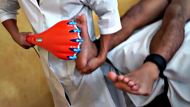 Gorgeous Josh comes in to Dr. Tickle's office for his annual checkup. Doctor Tickle and Vahn put Josh through a complete tickle treatment which includes therapeutic foot tickling with feathers and fingers.