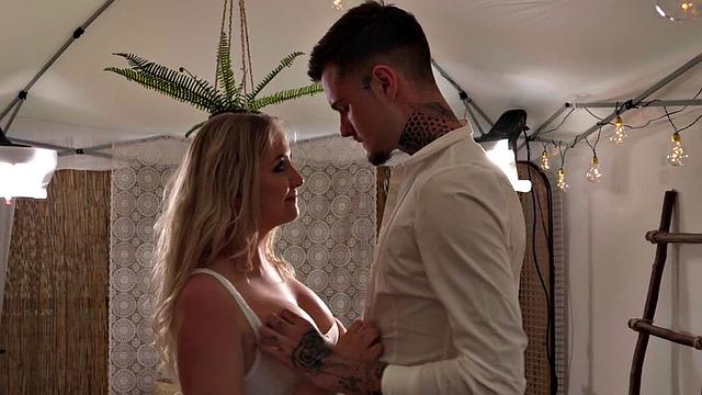 Big boobed blonde babe rides huge cock of her tattooed bf