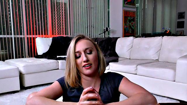 Dirty talk chick strokes a big dick with her oiled-up hands in POV