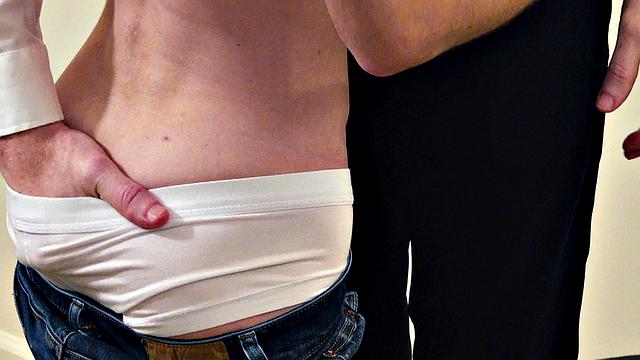 Petite patient by doctors on health check