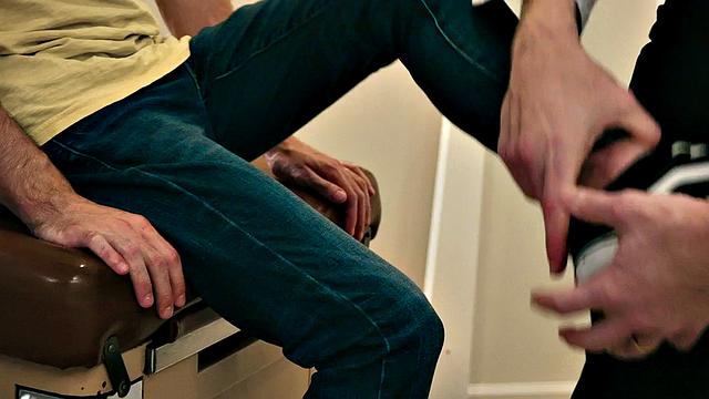 Petite patient by doctors on health check