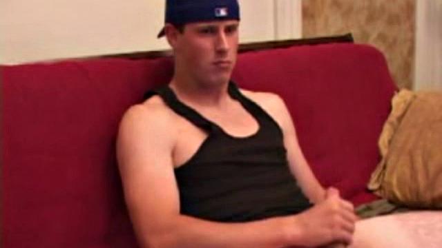 Young Maxx Wood works his cock under his shorts and then pulls it out to lube up. He strokes with determination, edging himself a few times, before covering his naked body in a splattering of warm cum.