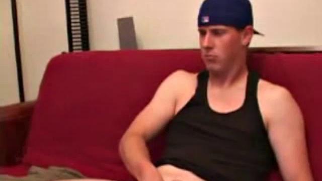 Young Maxx Wood works his cock under his shorts and then pulls it out to lube up. He strokes with determination, edging himself a few times, before covering his naked body in a splattering of warm cum.