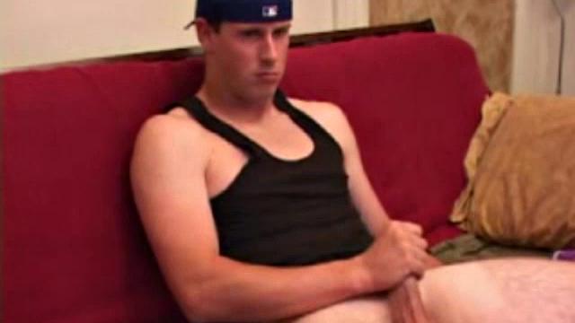 Young Maxx Wood works his cock under his shorts and then pulls it out to lube up. He strokes with determination, edging himself a few times, before covering his naked body in a splattering of warm cum.