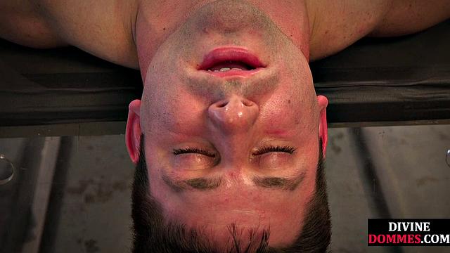 Dominatrix inserts objects in incel's ass