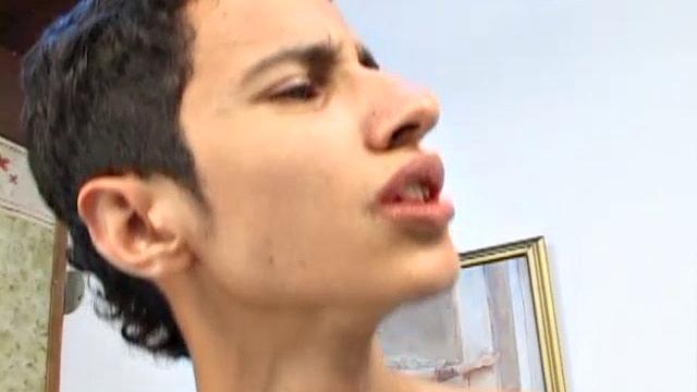 Marino and Fercho: a couple of skinny Latin twinks hot for each other. A desk in a vacant office is the perfect platform for these boys to strip down and go down on each other.