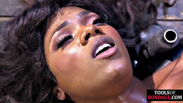 Hardtied ebony babe toyed by master