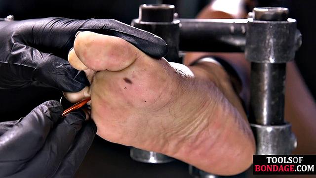 Hardtied ebony babe toyed by master