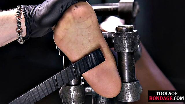 Hardtied ebony babe toyed by master