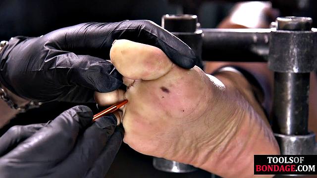 Hardtied ebony babe toyed by master