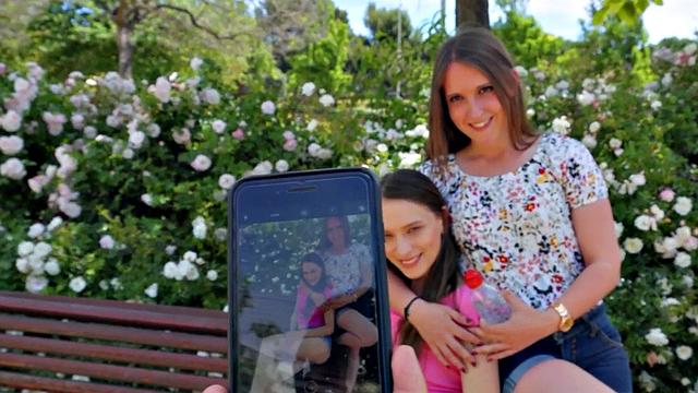 Watch this kinky teenie get her tight ass pounded in reverse cowgirl while wearing a t-shirt and sneakers outdoors