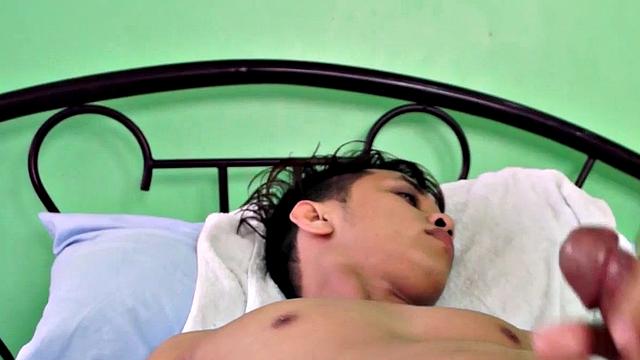 Showering Asian twink enjoys masturbating in solo