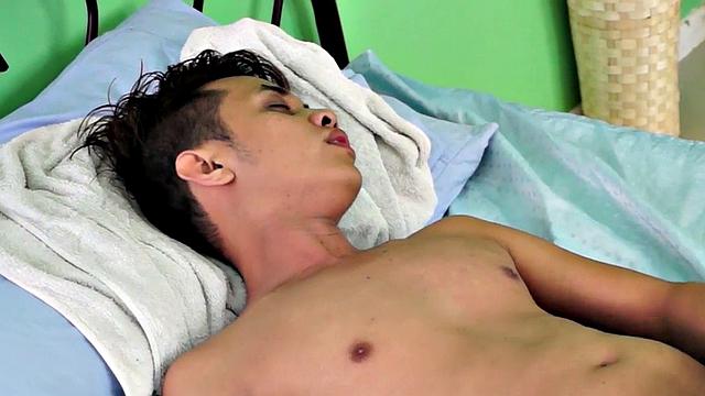 Showering Asian twink enjoys masturbating in solo