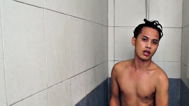 Showering Asian twink enjoys masturbating in solo