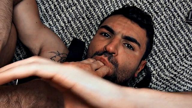 Hairy gay in leather harness barebacked in closeup video