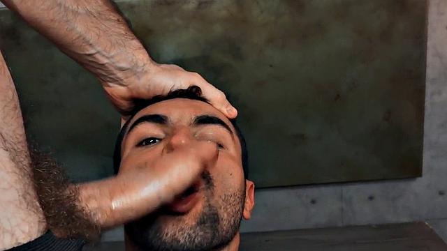 Hairy gay in leather harness barebacked in closeup video