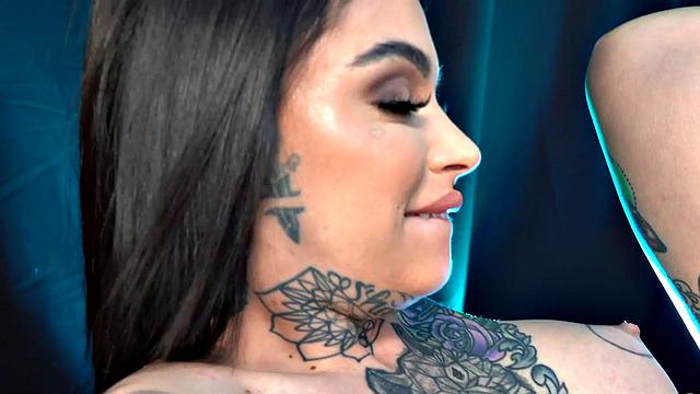 Tattooed tribbing babe licks GFs pussy before rubbing