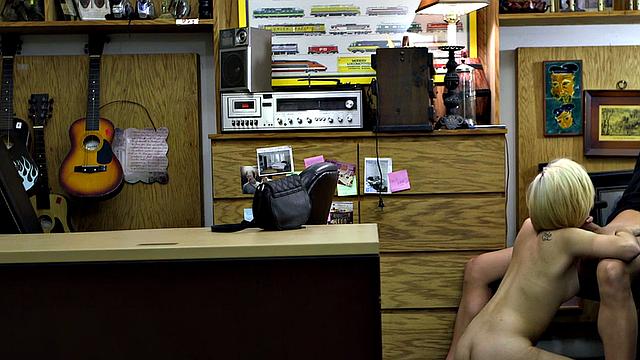 Pawnshop slut drilled hardcore by big white dick.