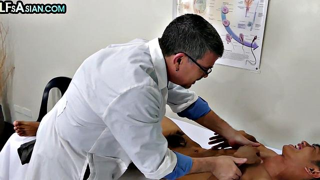 Mature doctor barebacks Asian twink on medical examination