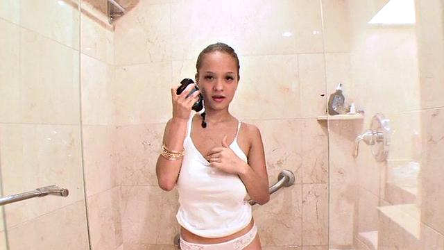 Teen Paris Milan showers her body in chocolate