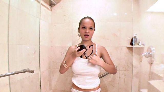 Teen Paris Milan showers her body in chocolate