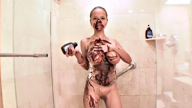 Teen Paris Milan showers her body in chocolate