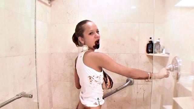 Teen Paris Milan showers her body in chocolate
