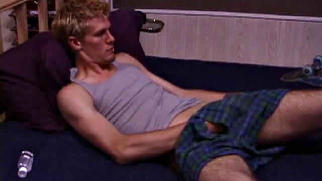 Skater boy Jonathan Priest comes home from a day of hard skateboarding to kick back and enjoy some porn. He slips out of his clothes to reveal pierced nipples, nice hairy legs and big balls lying underneath a long hard cock.