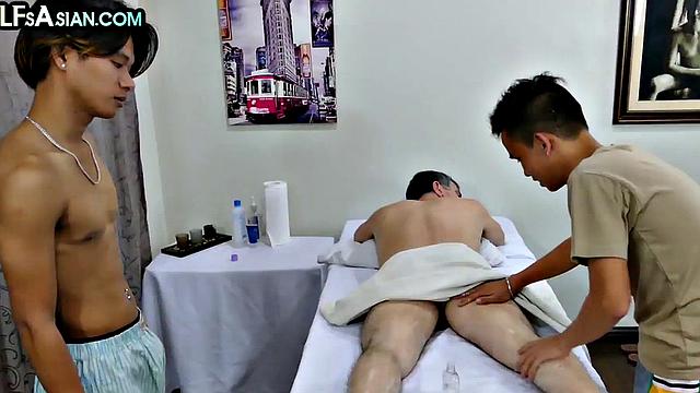 Massaged DILF by Asian skinny twink in 3some