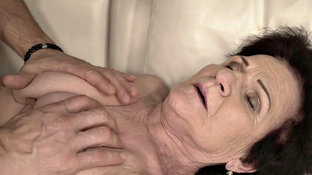 Kinky granny with hairy pussy and big tits takes a hard pounding from a lucky stud