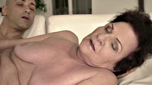 Kinky granny with hairy pussy and big tits takes a hard pounding from a lucky stud