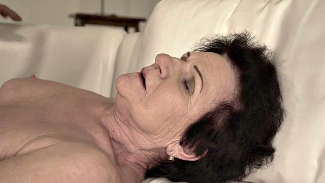 Kinky granny with hairy pussy and big tits takes a hard pounding from a lucky stud