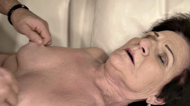 Kinky granny with hairy pussy and big tits takes a hard pounding from a lucky stud