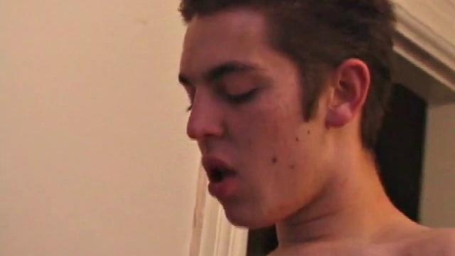 These 4 horny boys turn to porn to make their afternoon go by quickly. Pants come off and soon each is seated on the couch with cock in hand.