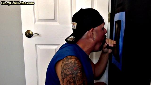 Gloryhole tattooed DILF sucks cock for load in amateur BJ video