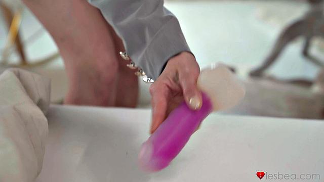 Lesbian MILF brings toy to work