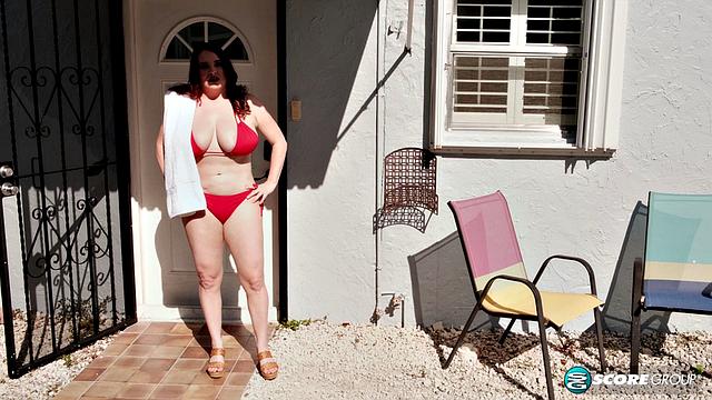 Maggie Green: Bikini Babe Takes Brick