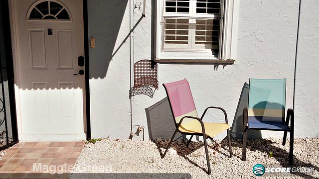 Maggie Green: Bikini Babe Takes Brick