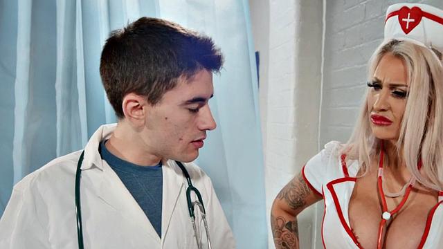 Blonde MILF nurse with huge tits gives a handjob and rides a hung little guy in a hospital bed