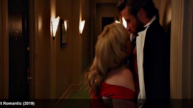 Liam Hemsworth strips and wraps a towel around his waist