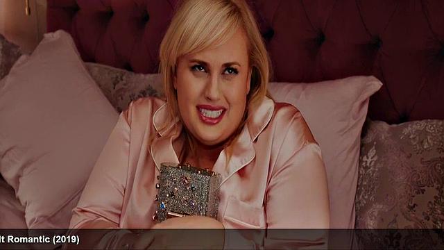 Liam Hemsworth strips and wraps a towel around his waist